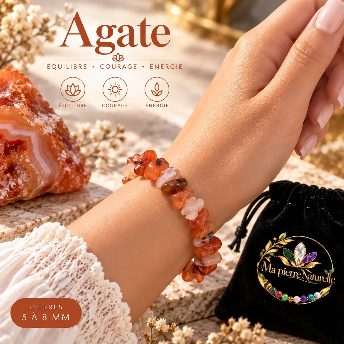 Bracelet en agate orange et blanche porté au poignet avec une manche en maille claire