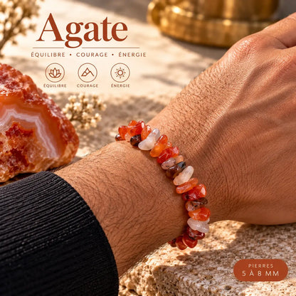 Bracelet en agate orange, blanche et brune porté au poignet avec une manche noire