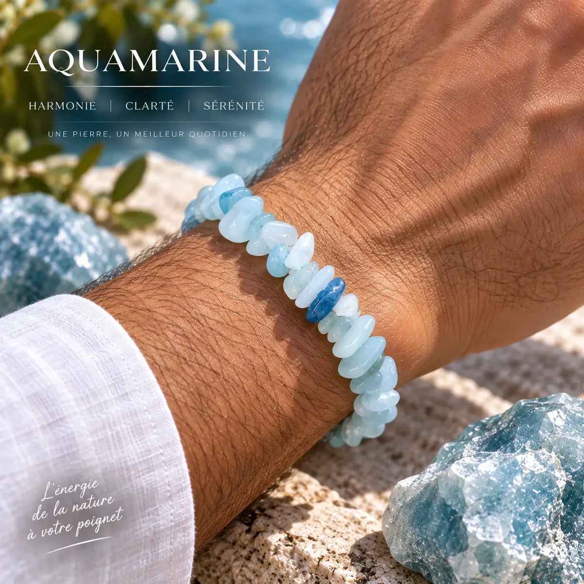 Bracelet en aigue-marine bleu clair porté au poignet avec une manche claire