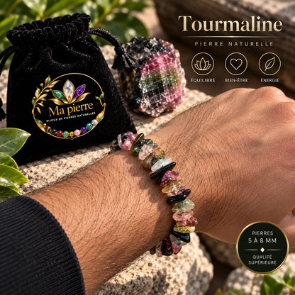Bracelet tourmaline multicolore porté au poignet avec une manche noire